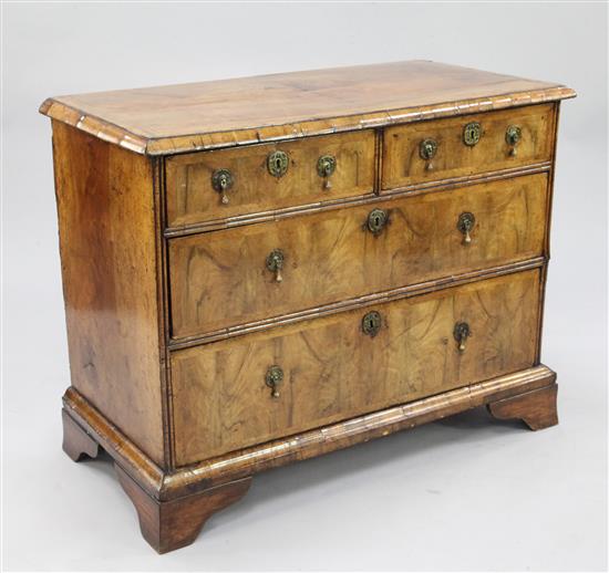 An 18th century walnut and featherbanded chest, W.3ft 3in.